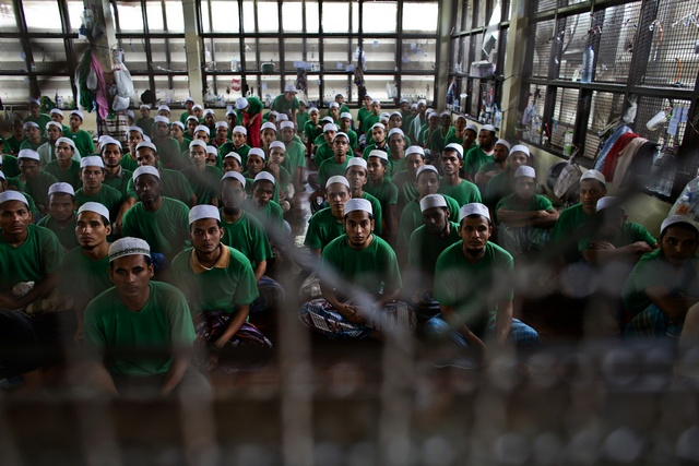 Undocumented Rohingya Muslim immigrants gather at the Immigration Detention Center during the Muslim holy fasting month of Ramadan in Kanchanaburi province, Thailand on July 10, 2013. © 2013 Reuters