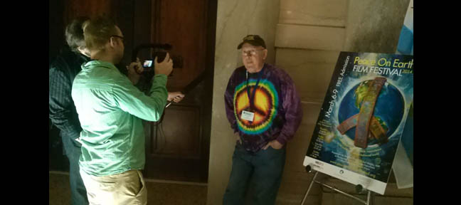 Regis Tremblay being interviewed after his film won the Exposé Award at the  Peace On Earth Film Festival 2014