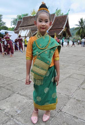  Young girl at Wat Xieng Thong. Photograph © Mark Ulyseas
