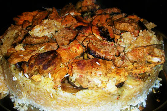 Mevlubi - upside down rice with layers of sauteed eggplant, potatoes and meat. Pic © Ozlem Warren