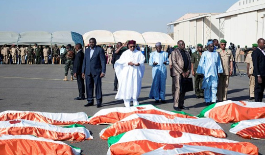 Flag draped body of soldiers killed during a Jihadist attack in display in Niger in December 2019. Image Courtesy: Global News